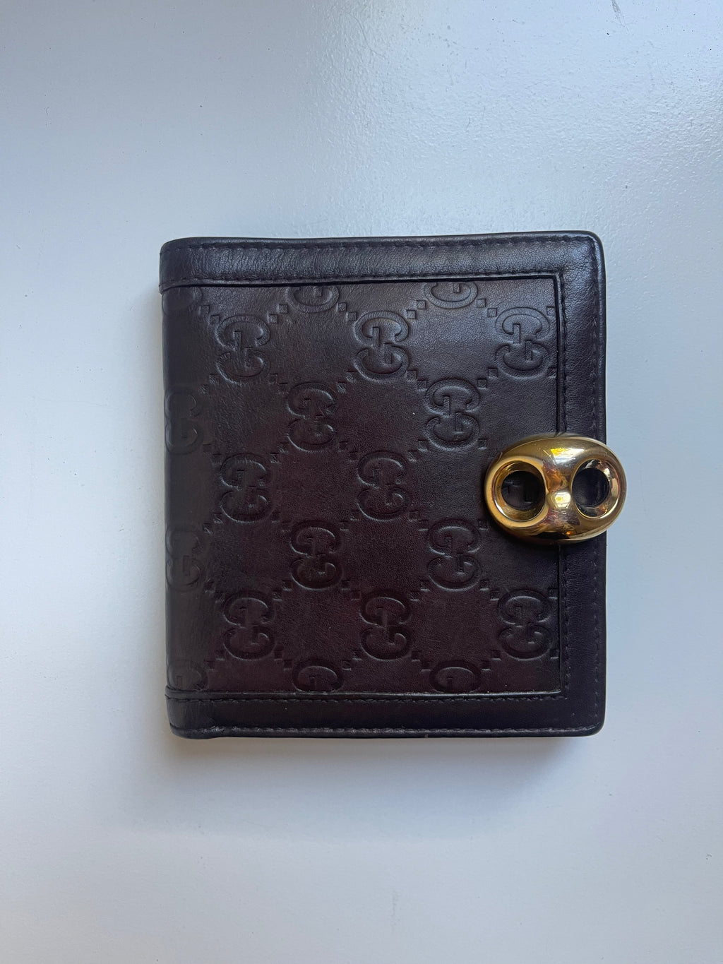 Gucci Guccissima Leather Bifold Wallet with Gold Medallion