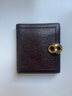 Gucci Guccissima Leather Bifold Wallet with Gold Medallion