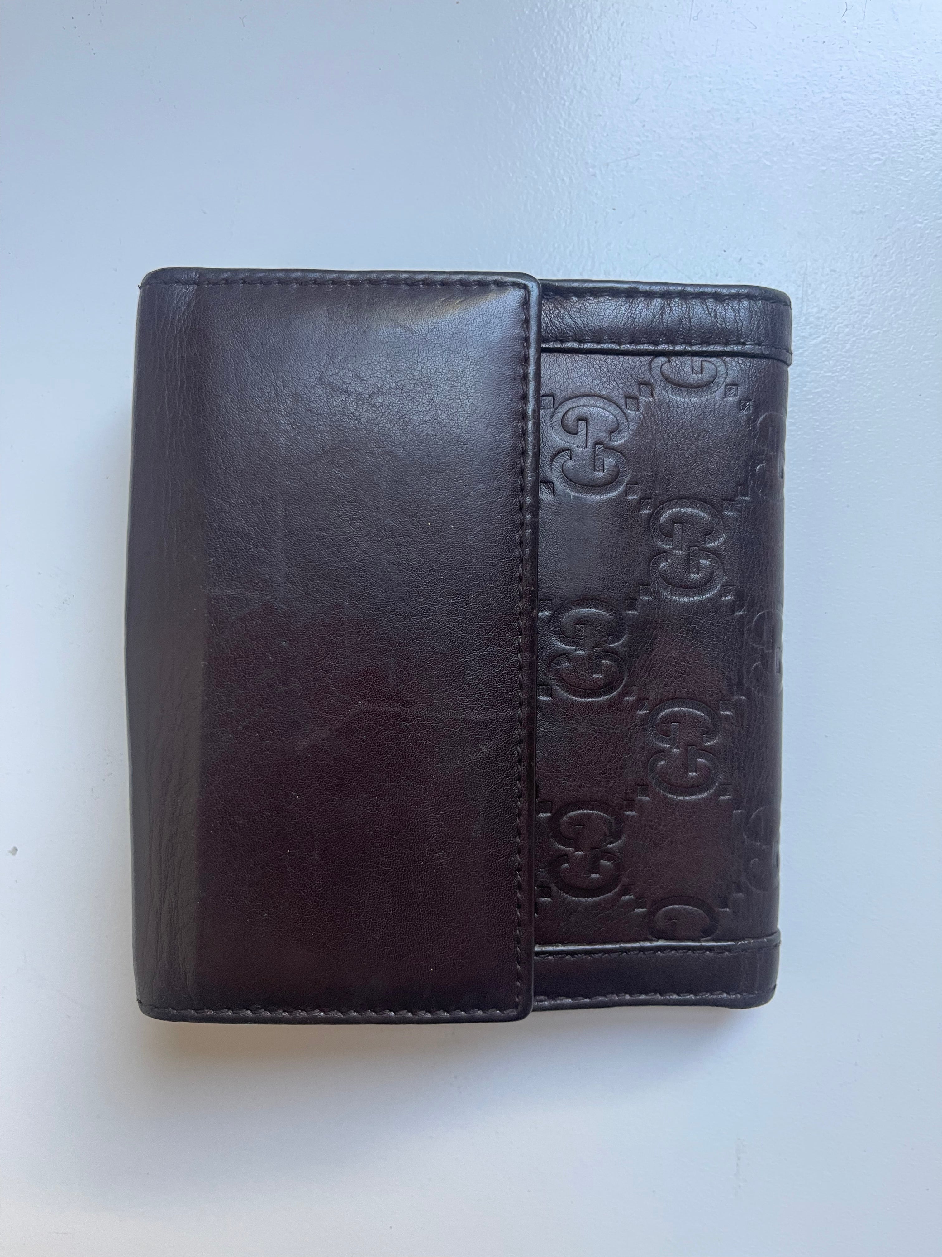 Gucci Guccissima Leather Bifold Wallet with Gold Medallion